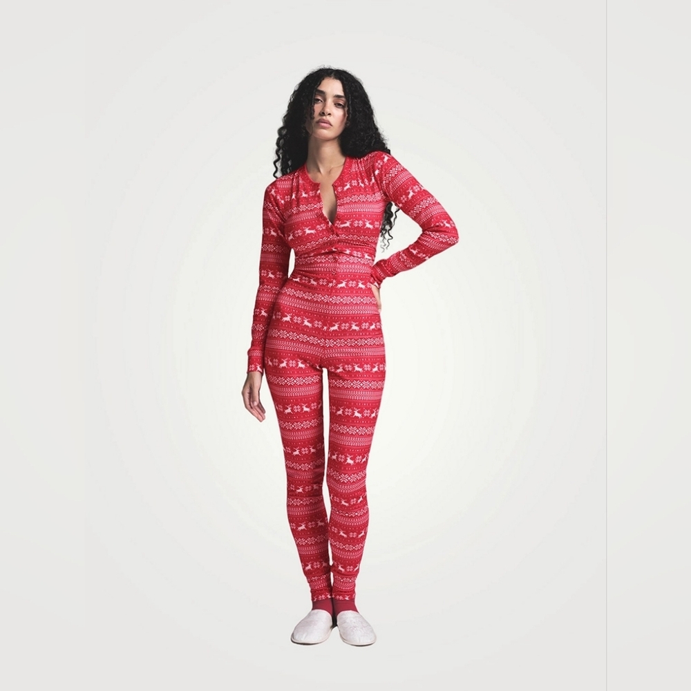 S1. NWT SKIMS LOGO PLUSH POINTELLE HENLEY ONESIE